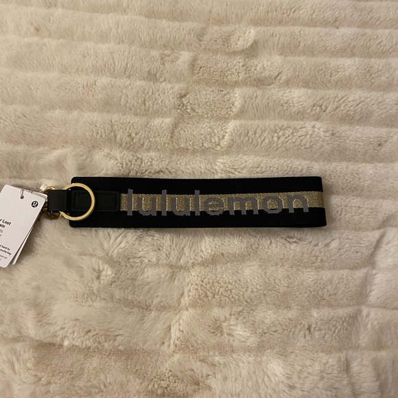 Lululemon Never lost key chain. Color sold out online. - Picture 3 of 3